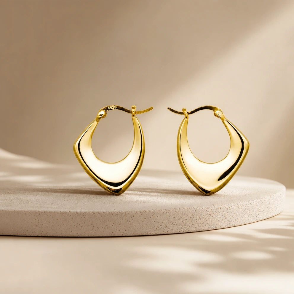 Abundance Gold Hoop Earrings by Frequency Paris-Ibiza. Chic, elegant, every day essentials. The perfect gold hoops to gift her.