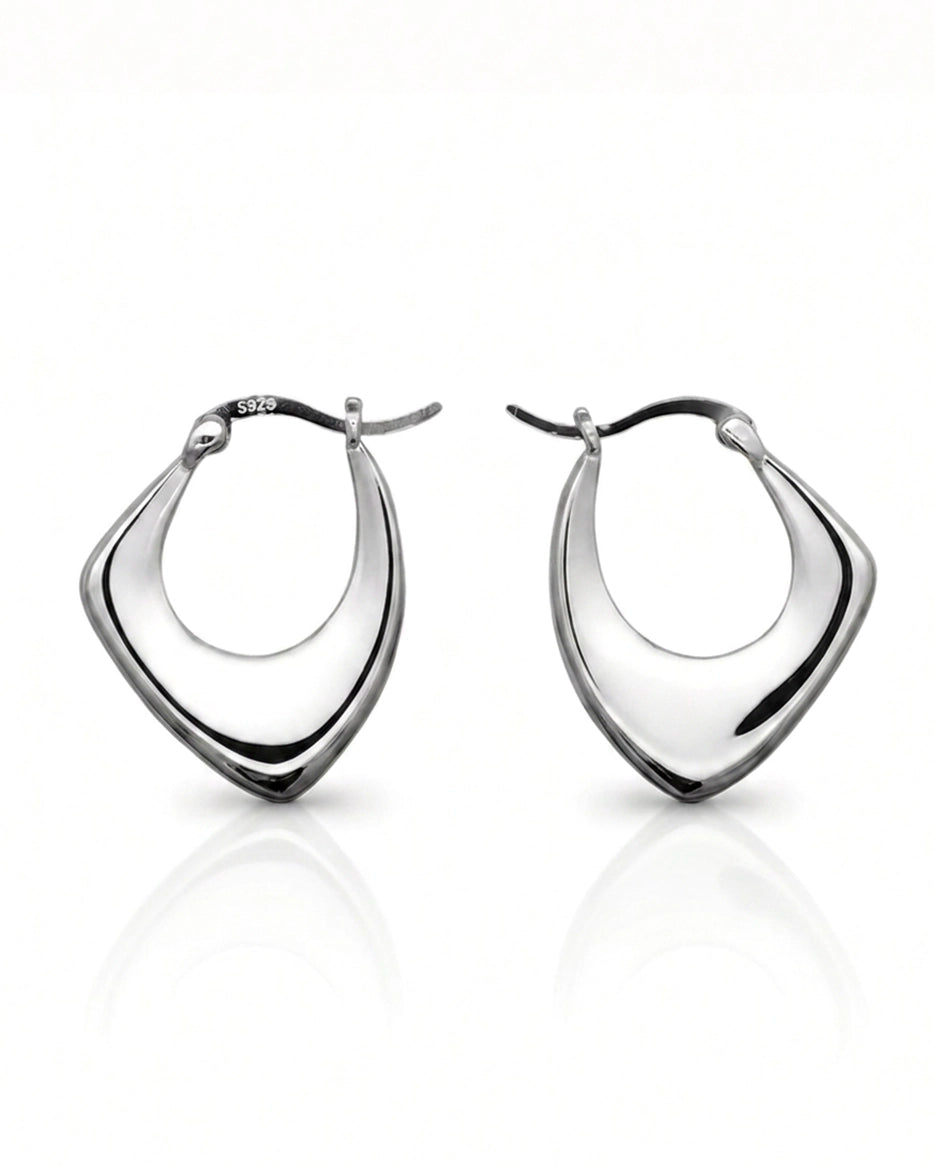 The iconic Abundance Gold Hoop Earrings are now available in Silver! Introducing the Abundance Silver Hoop Earrings. Crafted from premium rhodium plated sterling silver, they are a must-have for any silver-lover’s jewellery box. 