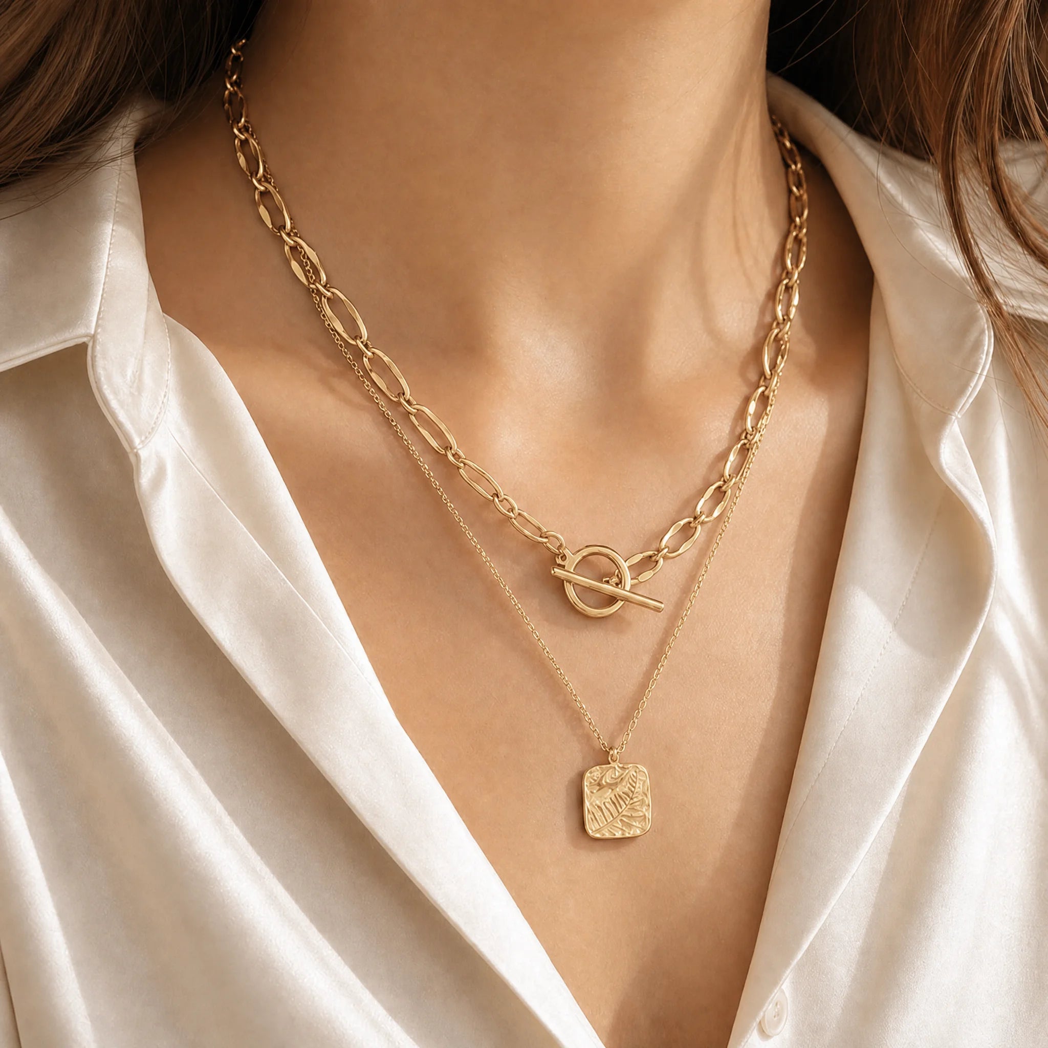 Burning Desire 18k gold plated T-Bar necklace styled in layers, versatile bold jewellery for everyday elegance. Frequency Paris-Ibiza