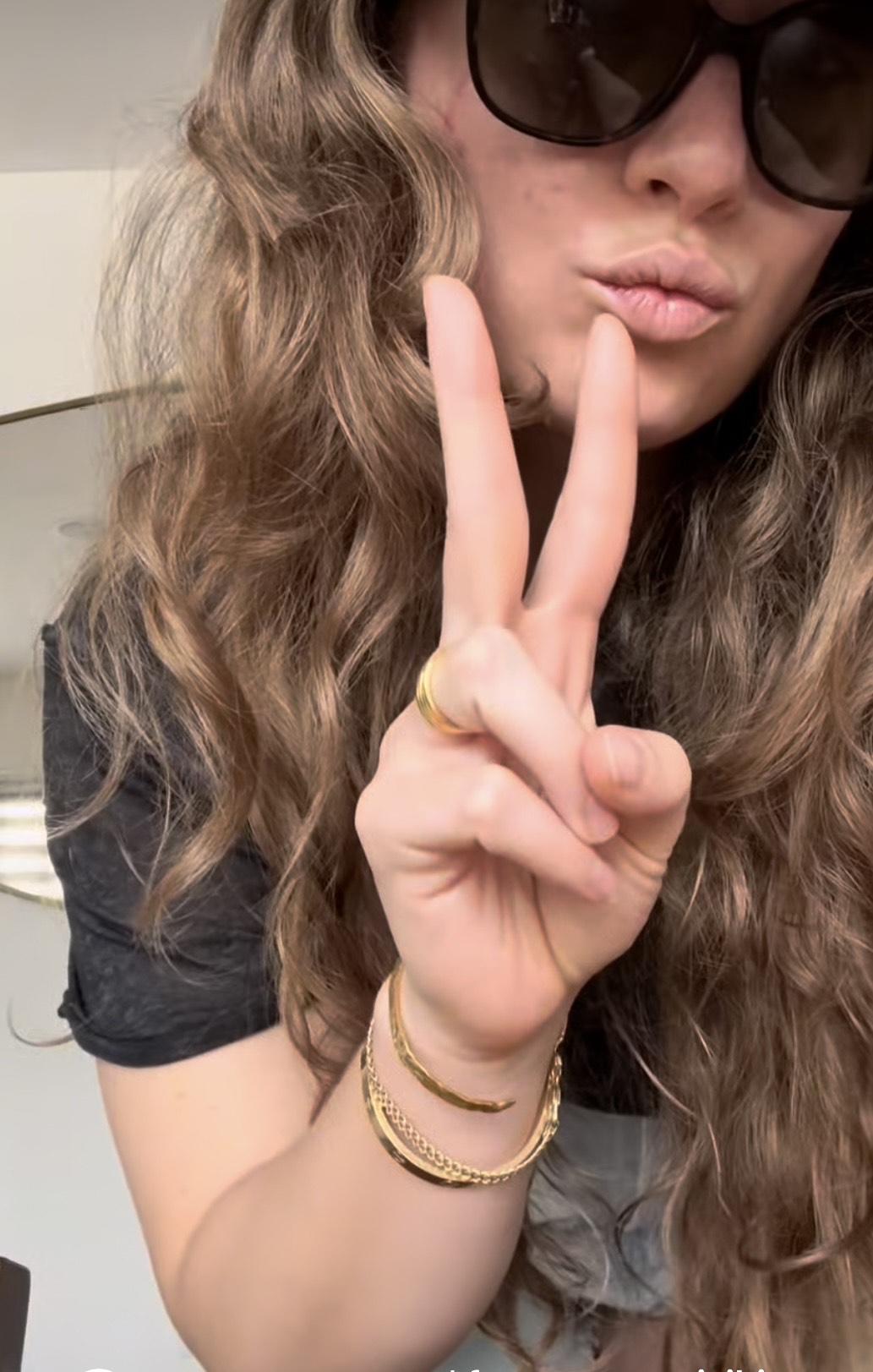 Customer photo of Christy wearing the So Hum Cuff Bracelet in sterling silver with 18K gold plating by Frequency Paris-Ibiza