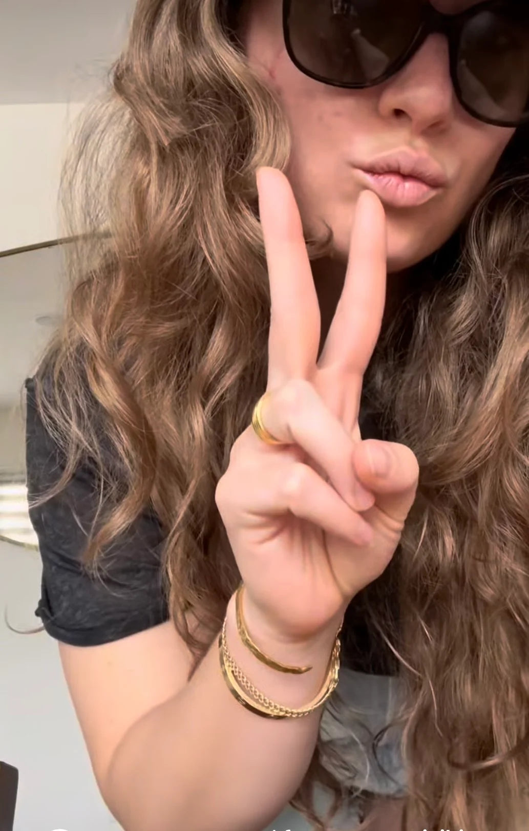 Customer photo of Christy wearing the So Hum Cuff Bracelet in sterling silver with 18K gold plating by Frequency Paris-Ibiza