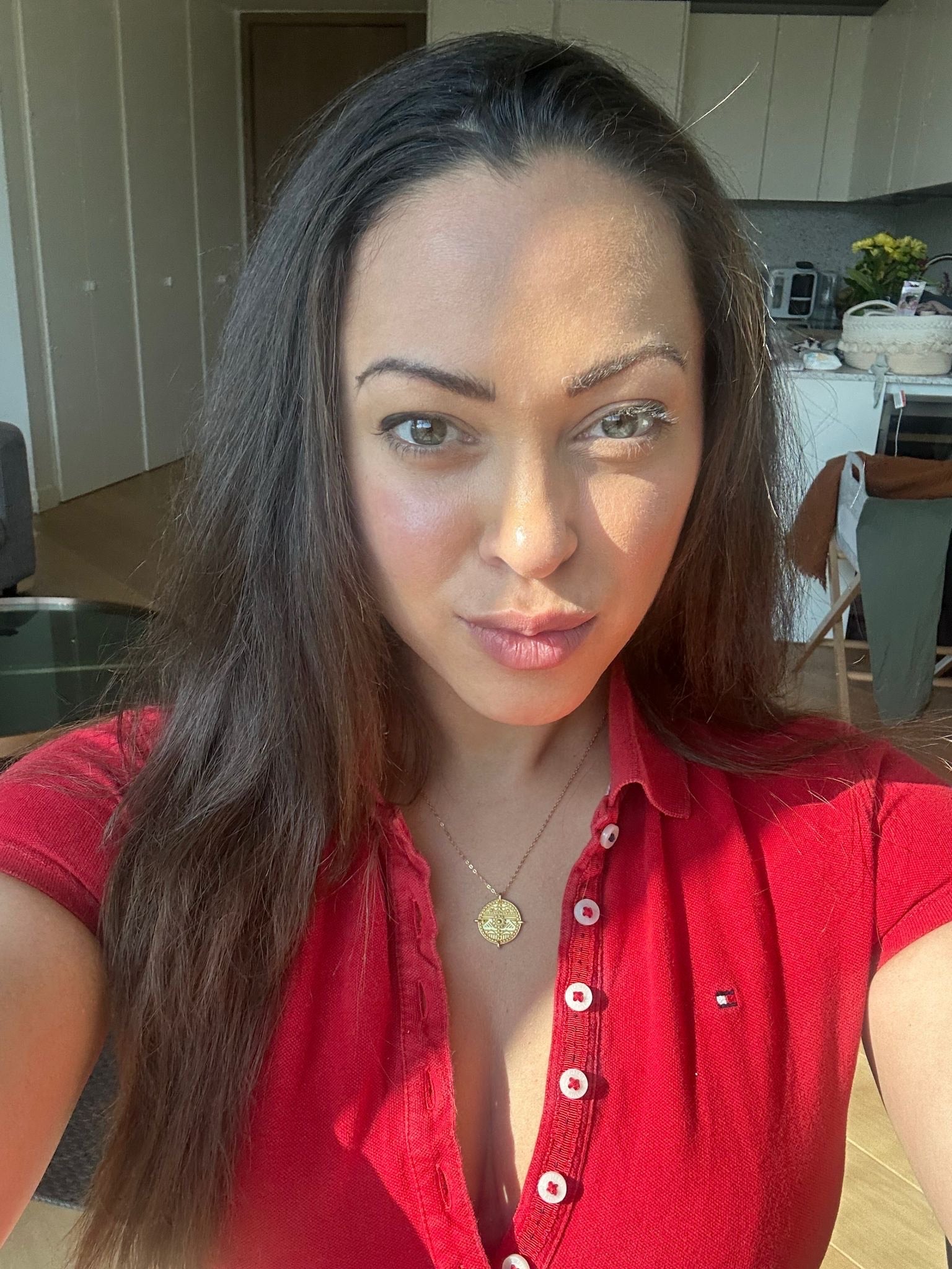 Customer photo of Imogen wearing the Es Vedrà Gold Pendant Necklace in sterling silver with 18K gold plating by Frequency Paris-Ibiza