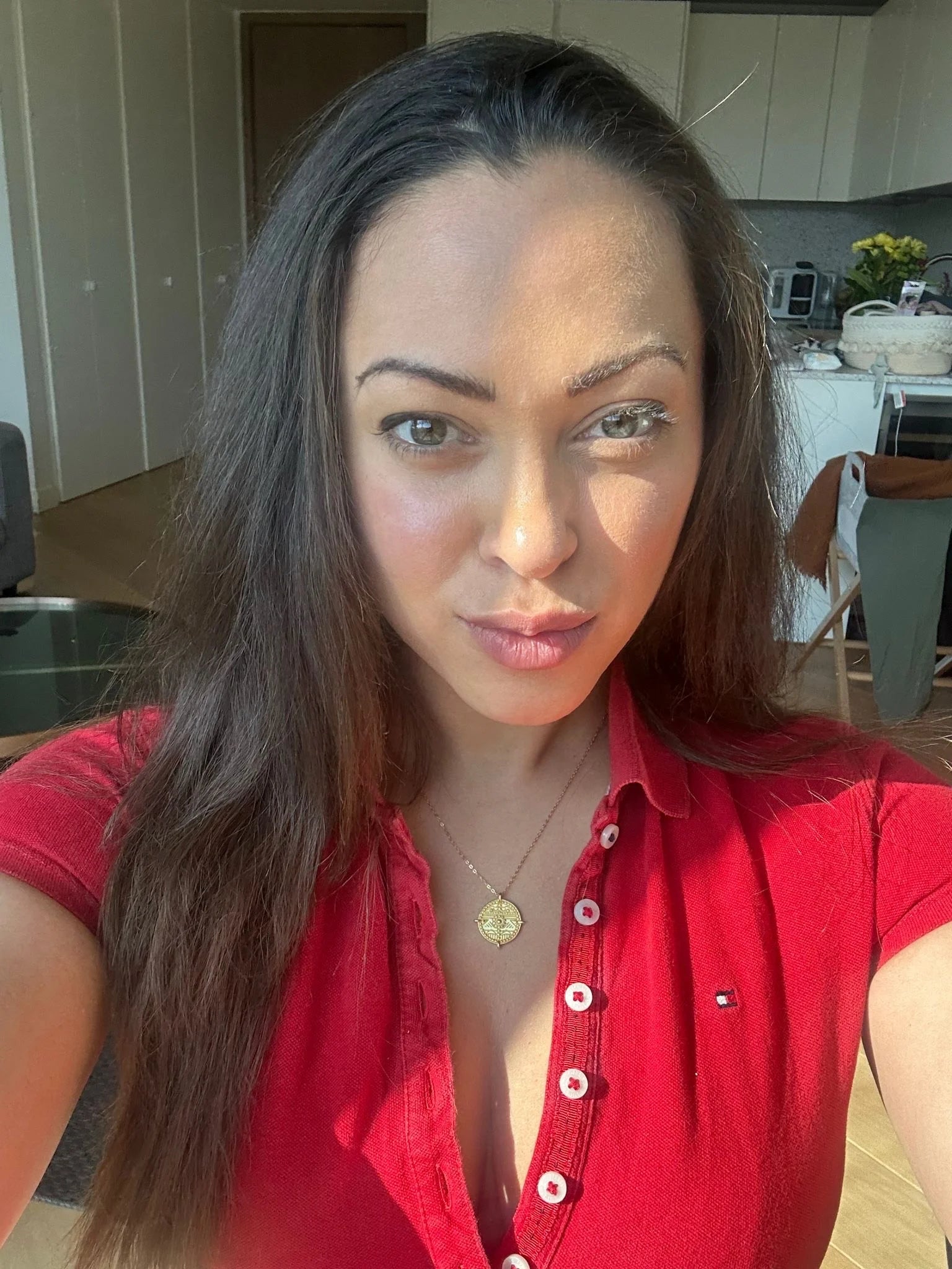 Customer photo of Imogen wearing the Es Vedrà Gold Pendant Necklace in sterling silver with 18K gold plating by Frequency Paris-Ibiza