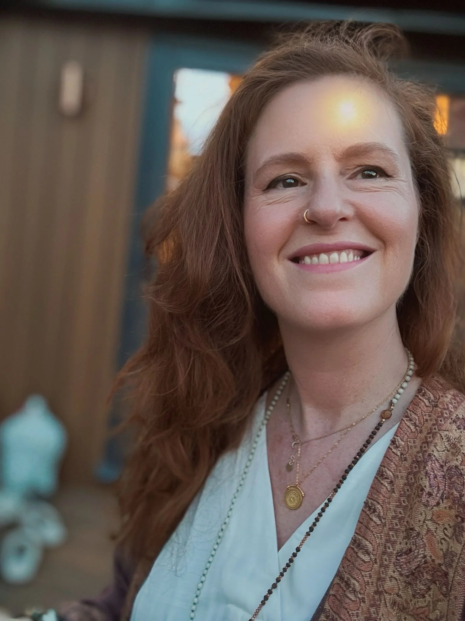 Customer photo of Justine wearing the Sunbeam Gold Pendant Necklace in sterling silver with 18K gold plating by Frequency Paris-Ibiza