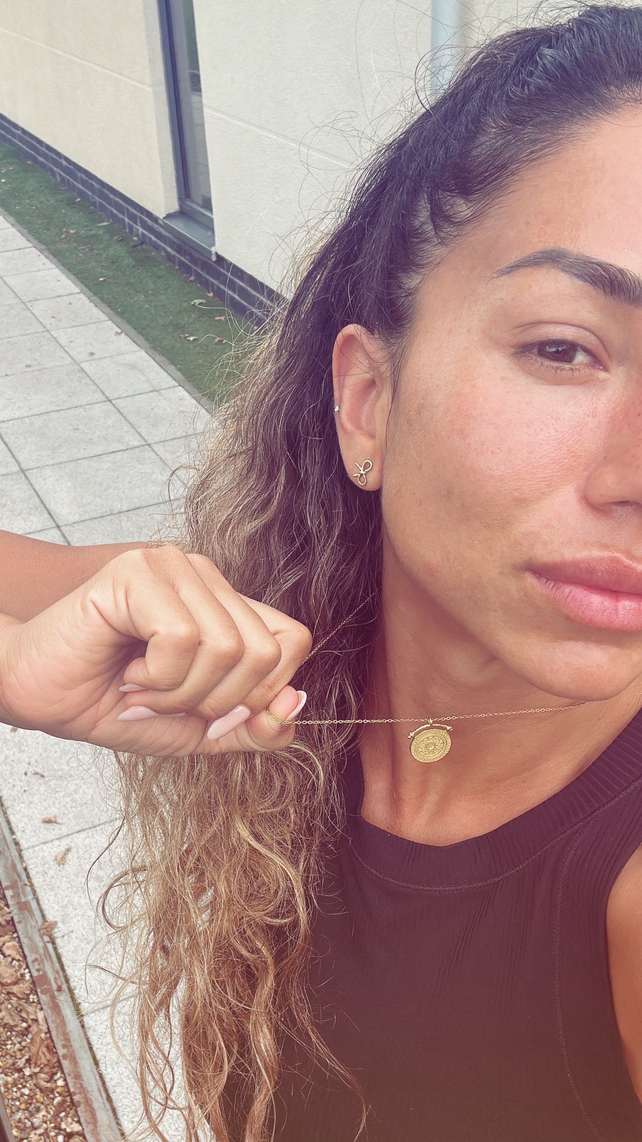 Customer photo of Kimmy wearing the Sunbeam Gold Pendant Necklace in sterling silver with 18K gold plating by Frequency Paris-Ibiza