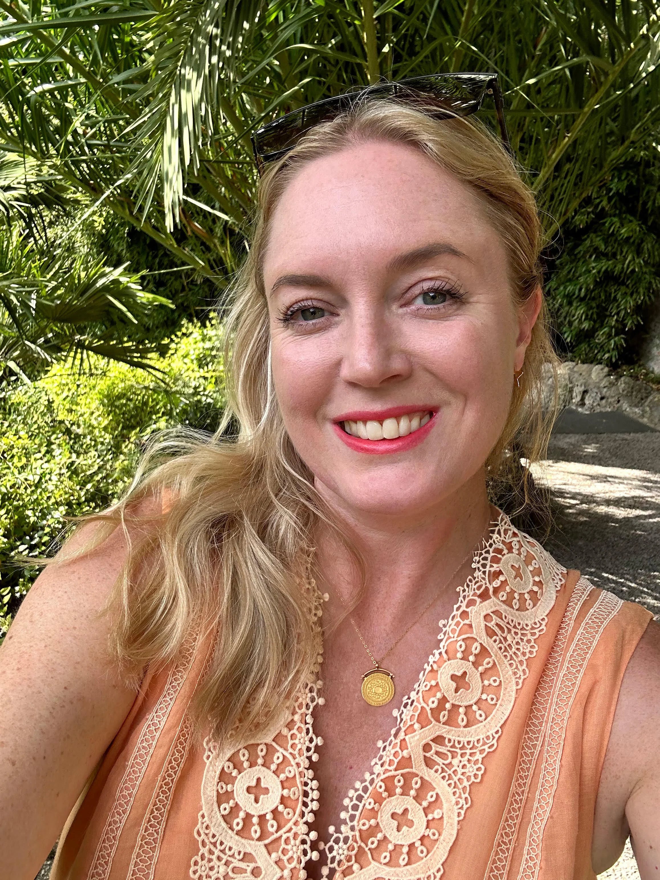 Customer photo of Kristin wearing the Sunbeam Gold Pendant Necklace in sterling silver with 18K gold plating by Frequency Paris-Ibiza