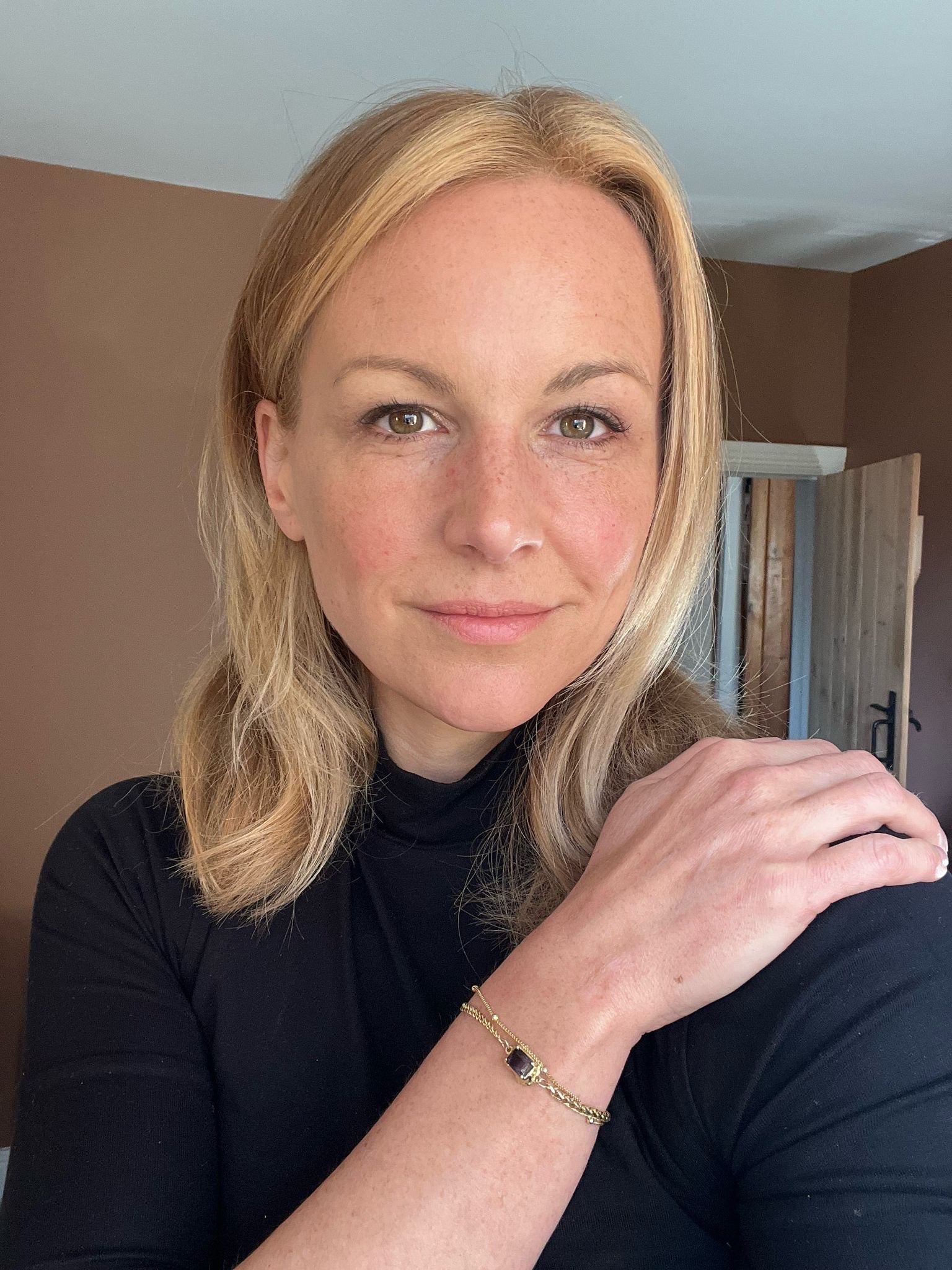 Customer photo of Natalie wearing the Alchemy Chain Bracelet in sterling silver with 18K gold plating by Frequency Paris-Ibiza