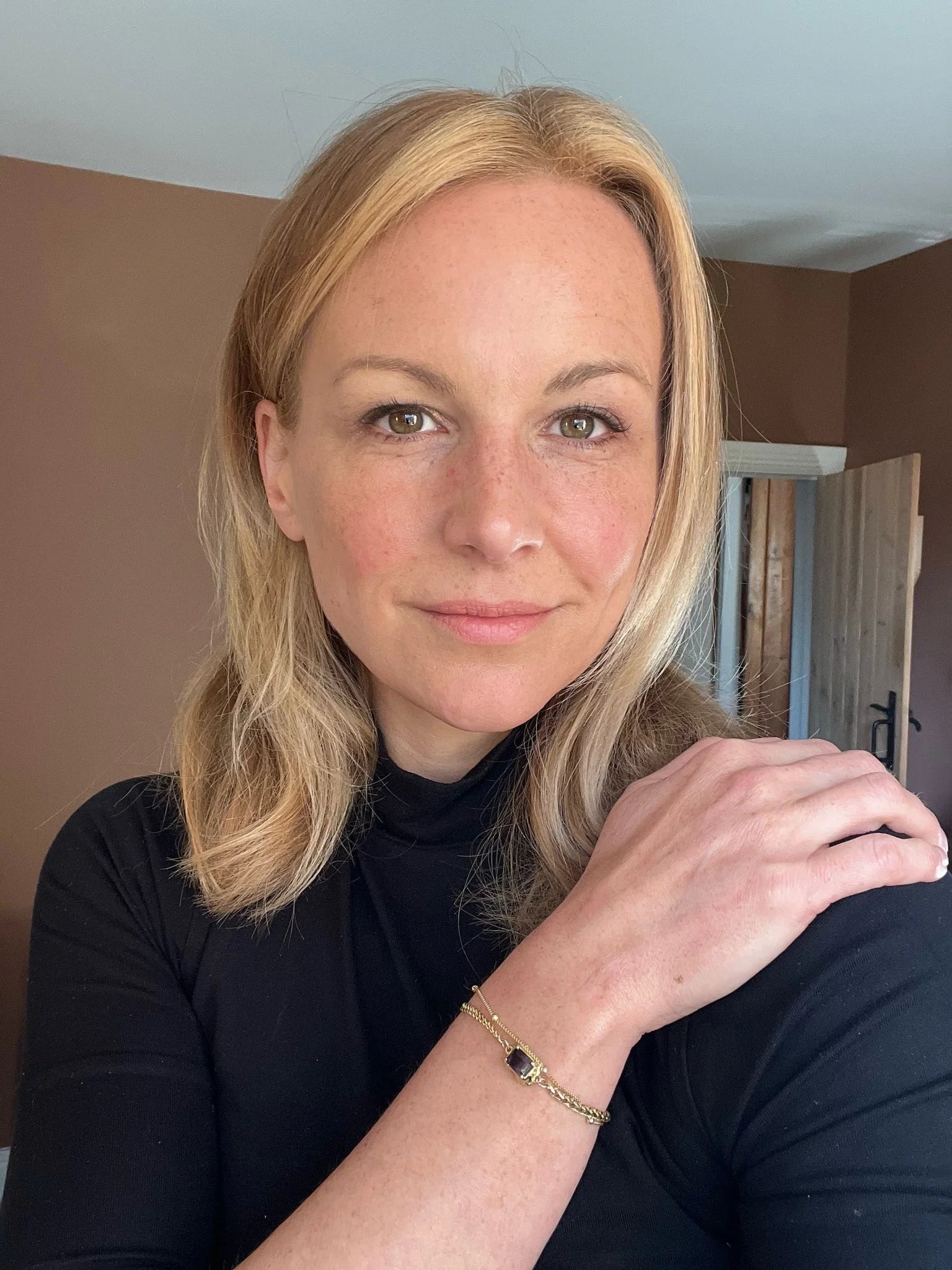 Customer photo of Natalie wearing the Alchemy Chain Bracelet in sterling silver with 18K gold plating by Frequency Paris-Ibiza