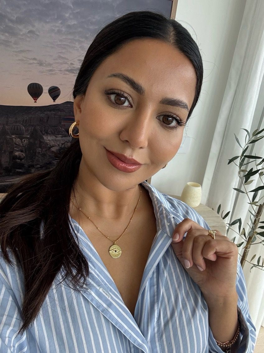 Customer photo of Sonia wearing the Protection Gold Pendant Necklace in sterling silver with 18K gold plating by Frequency Paris-Ibiza