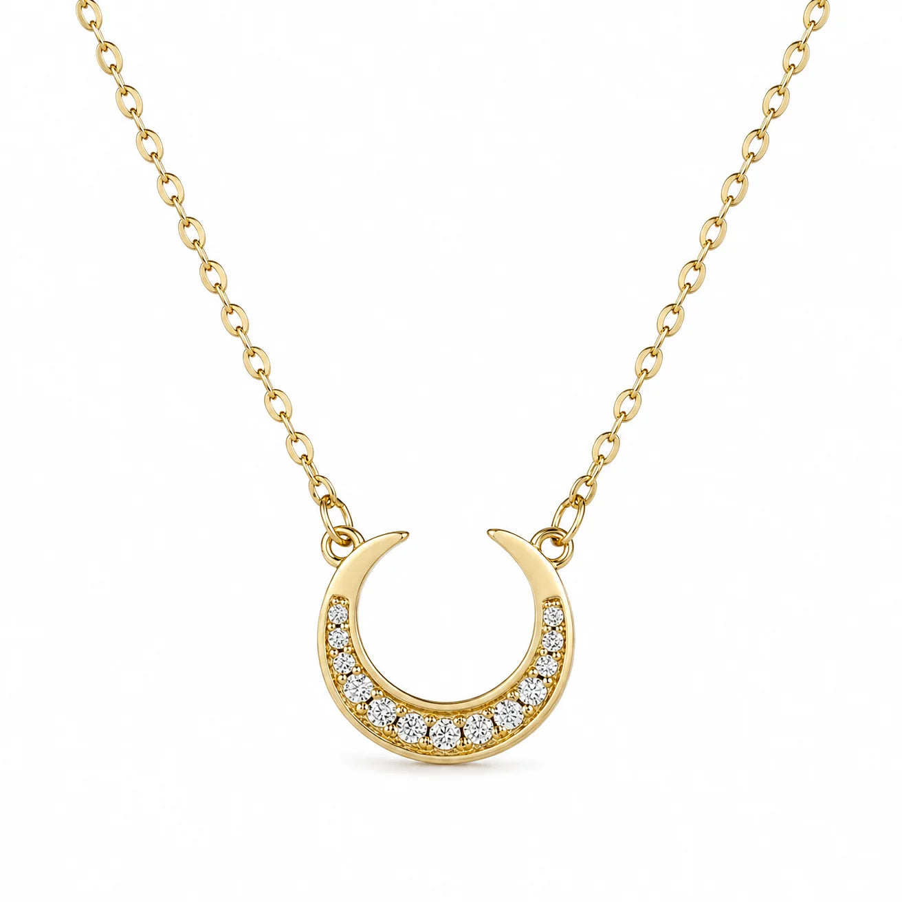 Dreamscape Gold Pendant Necklace by Frequency Paris-Ibiza — celestial crescent moon pendant with zircon crystals on white background, highlighting exquisite detail.