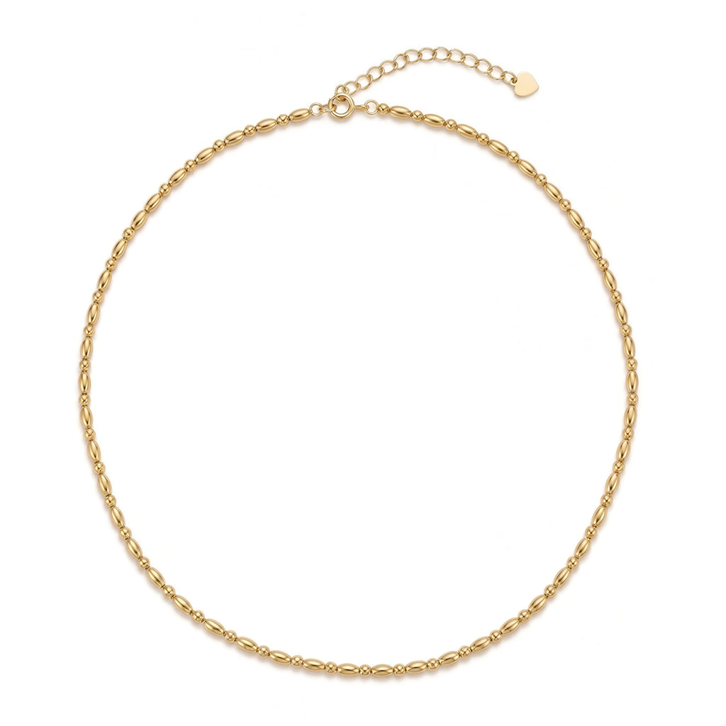 The best layering necklace - the Eclipse Gold Beaded Choker. The ultimate stacking staple, perfect for mixing with longer chains and pendants. Also looks elegant when worn solo.