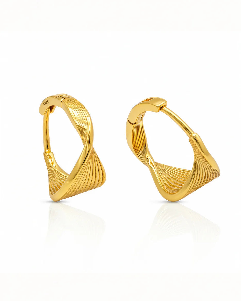 18K gold-plated sterling silver Eternal Wave Gold Hoop Earrings by Frequency Paris-Ibiza against a white background