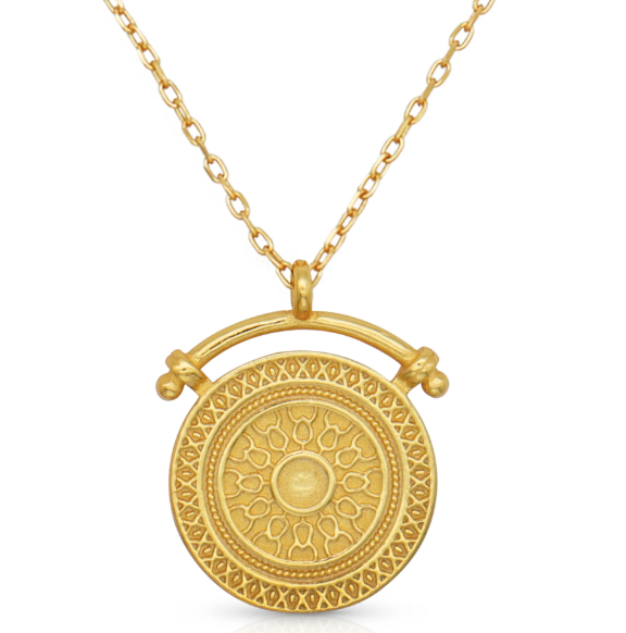 Close-up of Sunbeam Gold Pendant Necklace with 18K gold plating. Frequency Paris-Ibiza