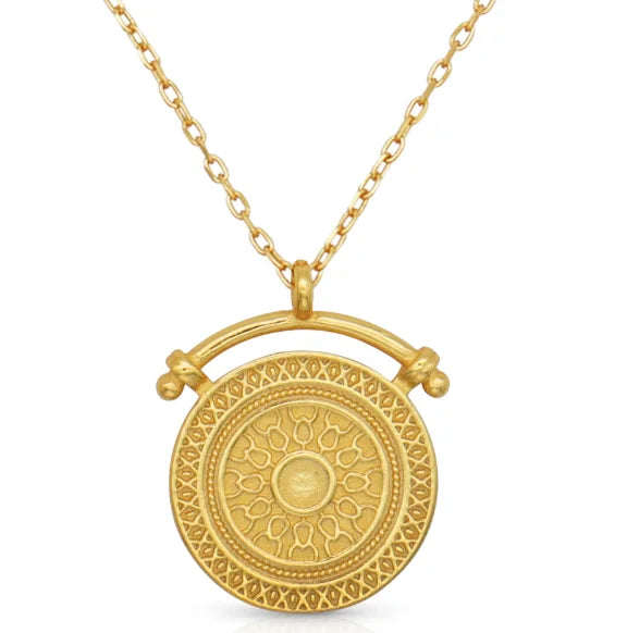 Close-up of Sunbeam Gold Pendant Necklace with 18K gold plating. Frequency Paris-Ibiza