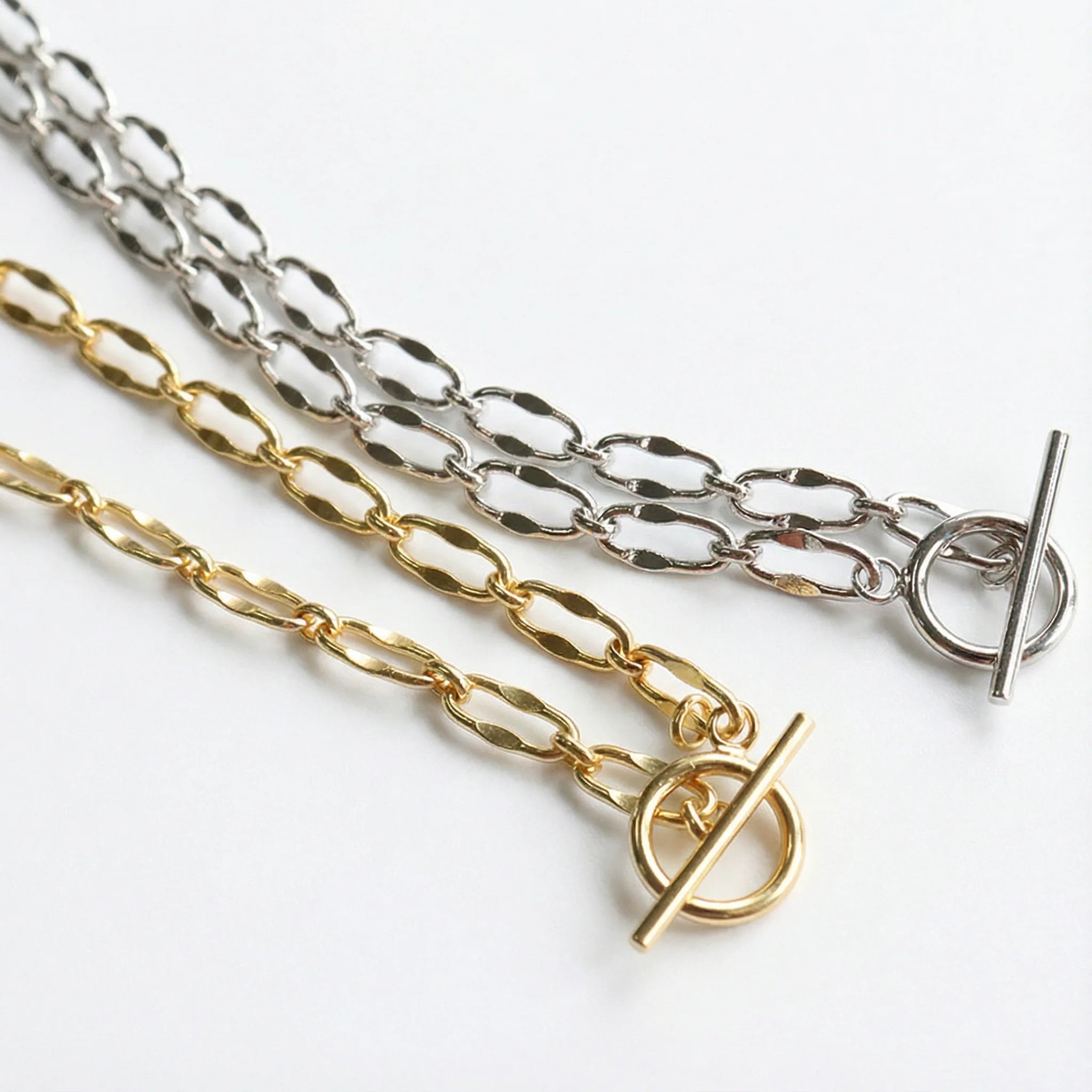 Burning Desire T-Bar chain necklaces in 18k gold plated and sterling silver, stylish versatile jewellery for layering or solo wear. Shop now at Frequency Paris-Ibiza