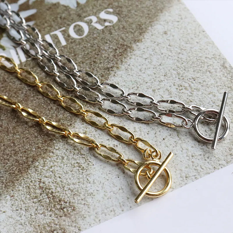 Burning Desire T-Bar chain necklaces in 18k gold plated and sterling silver, stylish versatile jewellery for layering or solo wear. Shop now at Frequency Paris-Ibiza