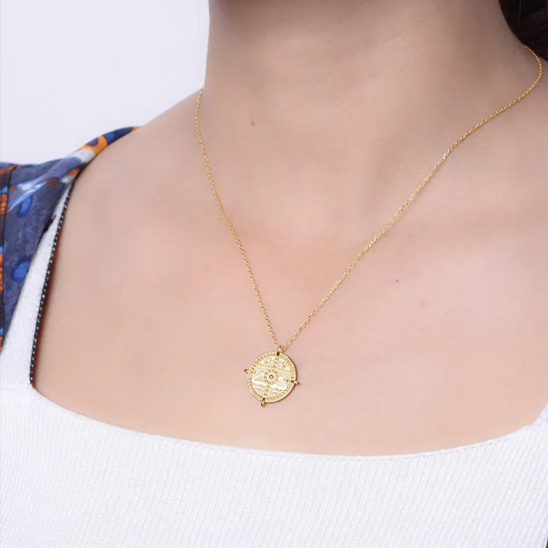 Es Vedrà gold pendant necklace, versatile styling for everyday or statement wear. Frequency Paris-Ibiza