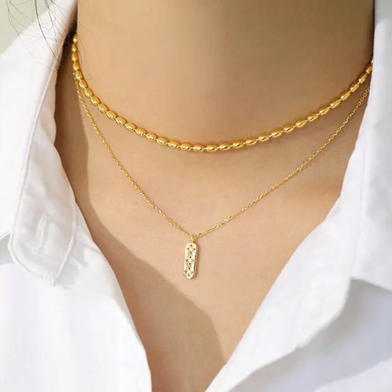 Guiding Light pendant necklace layered with delicate gold chains, 18k gold plated sterling silver, stylish everyday jewellery. Frequency Paris-Ibiza