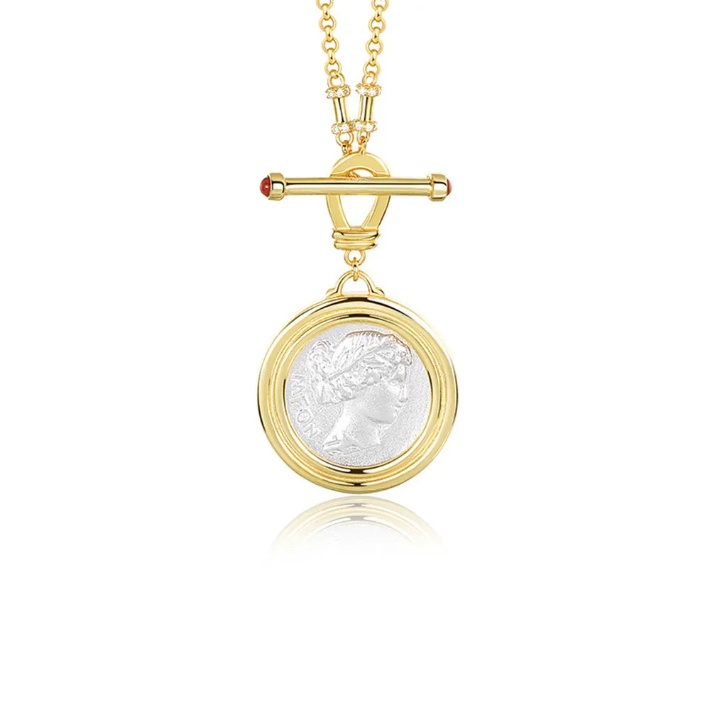 Soul Purpose Gold Pendant Necklace in silver coin finish — close-up detail of the pendant. Frequency Paris-Ibiza