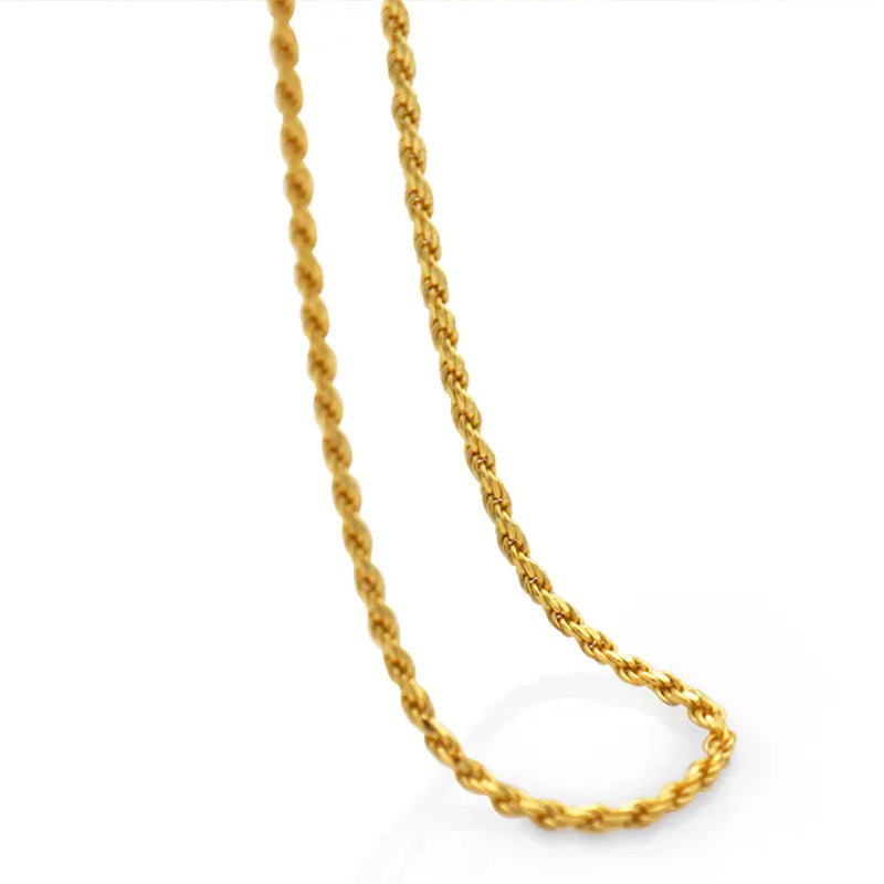 Close-up of the Positivity Gold Rope Chain Necklace showing gold rope chain detail and polished finish for a versatile, stylish look. Frequency Paris-Ibiza