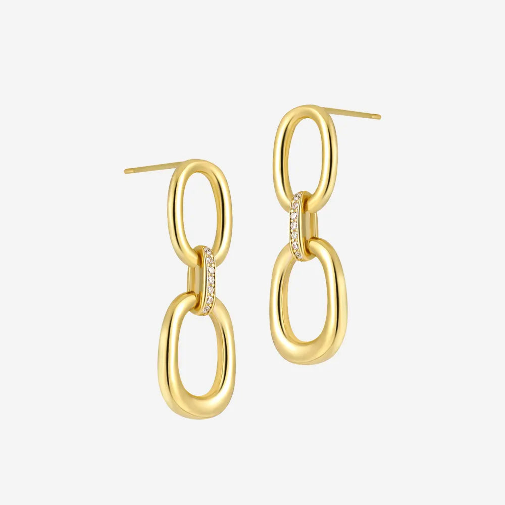 Frequency Paris-Ibiza Power Drop Earrings in 18K gold-plated sterling silver. Two oval hoops joined with a zircon crystal chain link. Elegant, stunning statement drop earrings on a white background.