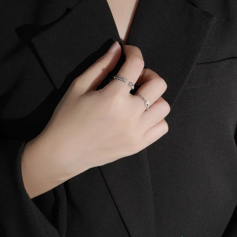 Model wearing the Frequency Paris-Ibiza Resonance Ring in rhodium plated sterling silver, perfect for silver jewellery lovers