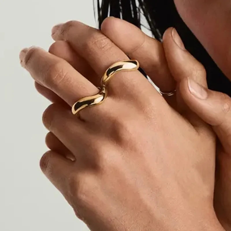 Two Stillness Rings by Frequency Paris-Ibiza styled together. Bold, cool statement stack, intentionally designed in 18K gold plated sterling silver. Sustainably made to order.