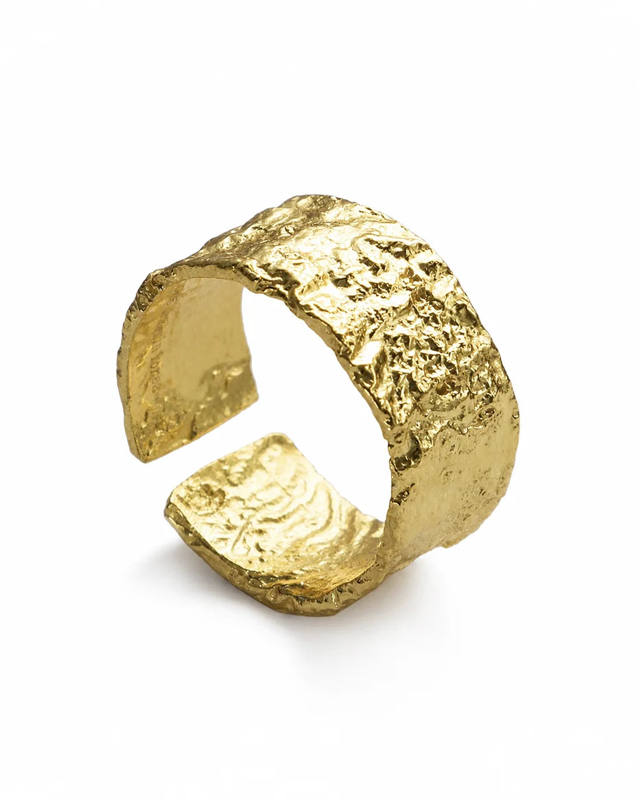 Gaia Ring by Frequency Paris-Ibiza, featuring a hammered gold texture that celebrates organic shapes, displayed against a clean white background. This adjustable ring is 18k gold-plated sterling silver, offering a grounded and contemporary design.