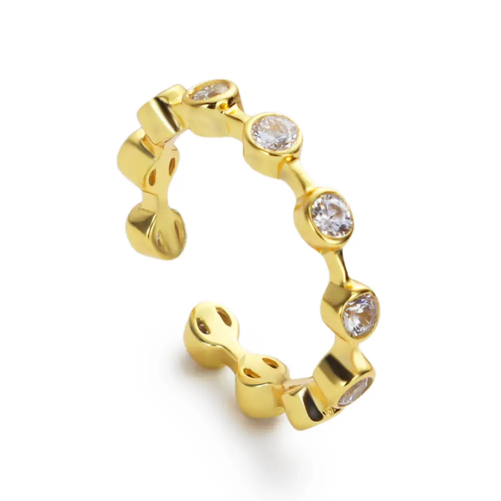 Gratitude Ring on white background, 18K gold plated sterling silver band with sparkling zircon crystal accents from Frequency Paris-Ibiza