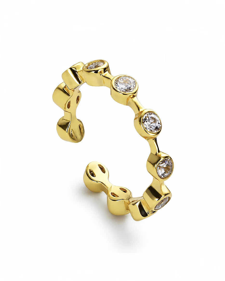Gratitude Ring on white background, 18K gold plated sterling silver band with sparkling zircon crystal accents from Frequency Paris-Ibiza