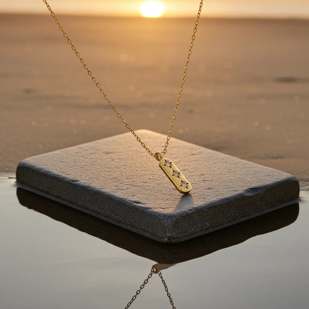 A close up of the gemstone accents - Guiding Light Gold Pendant Necklace by Frequency Paris-Ibiza. 