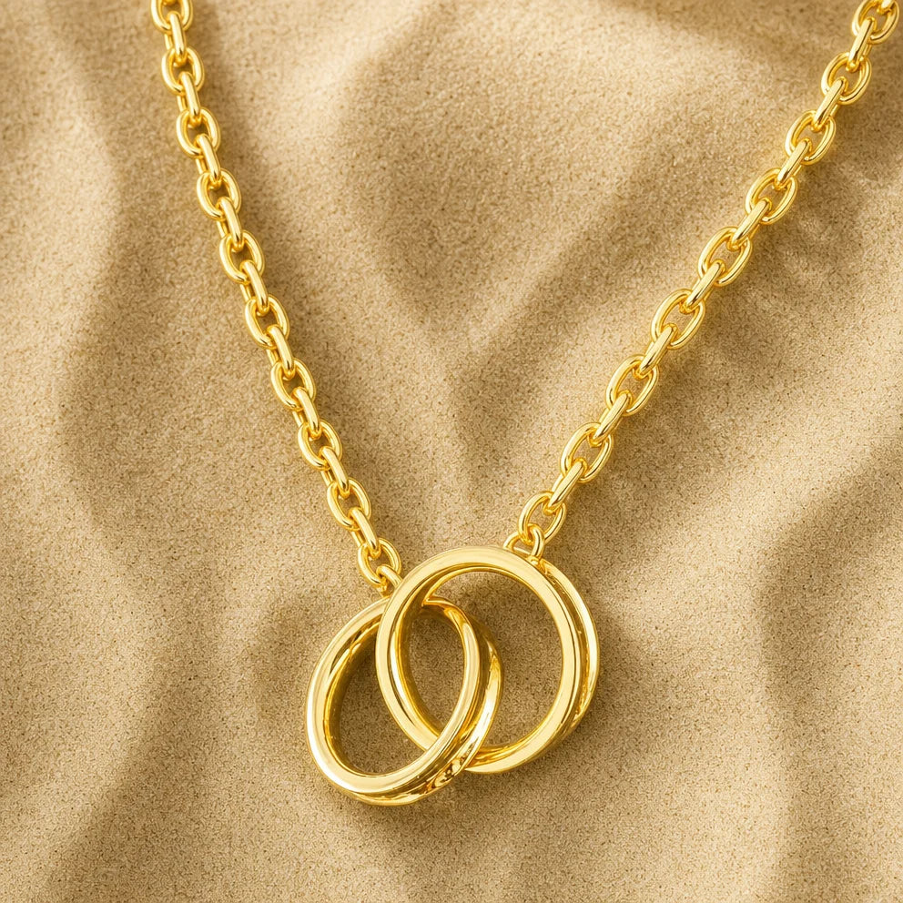 Close-up of Frequency Paris-Ibiza Infinite Possibilities Gold Chain Bracelet showing interlocking circles, craftsmanship, and chain details