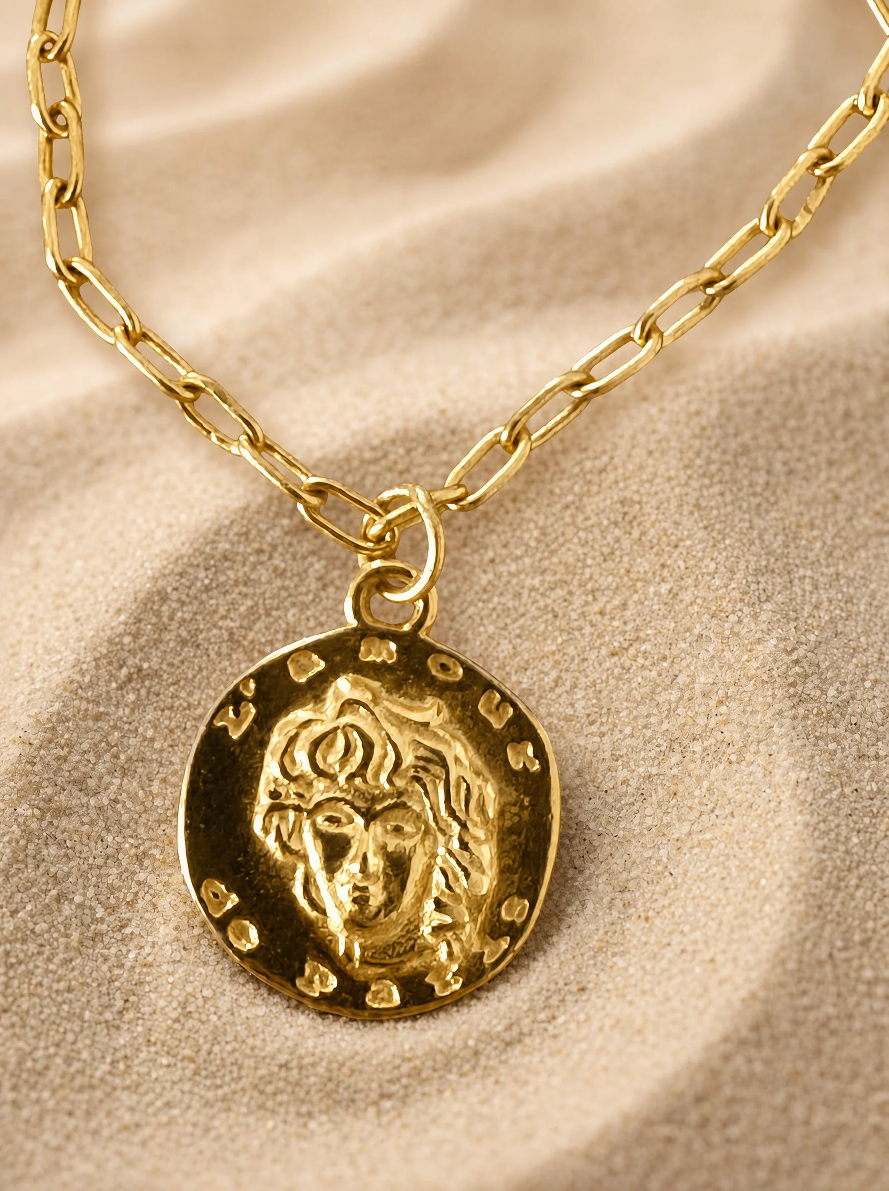 Frequency Paris-Ibiza L'Amour Gold Chain Bracelet detailed close-up of coin charm showing L'Amour de Paris text and unique design