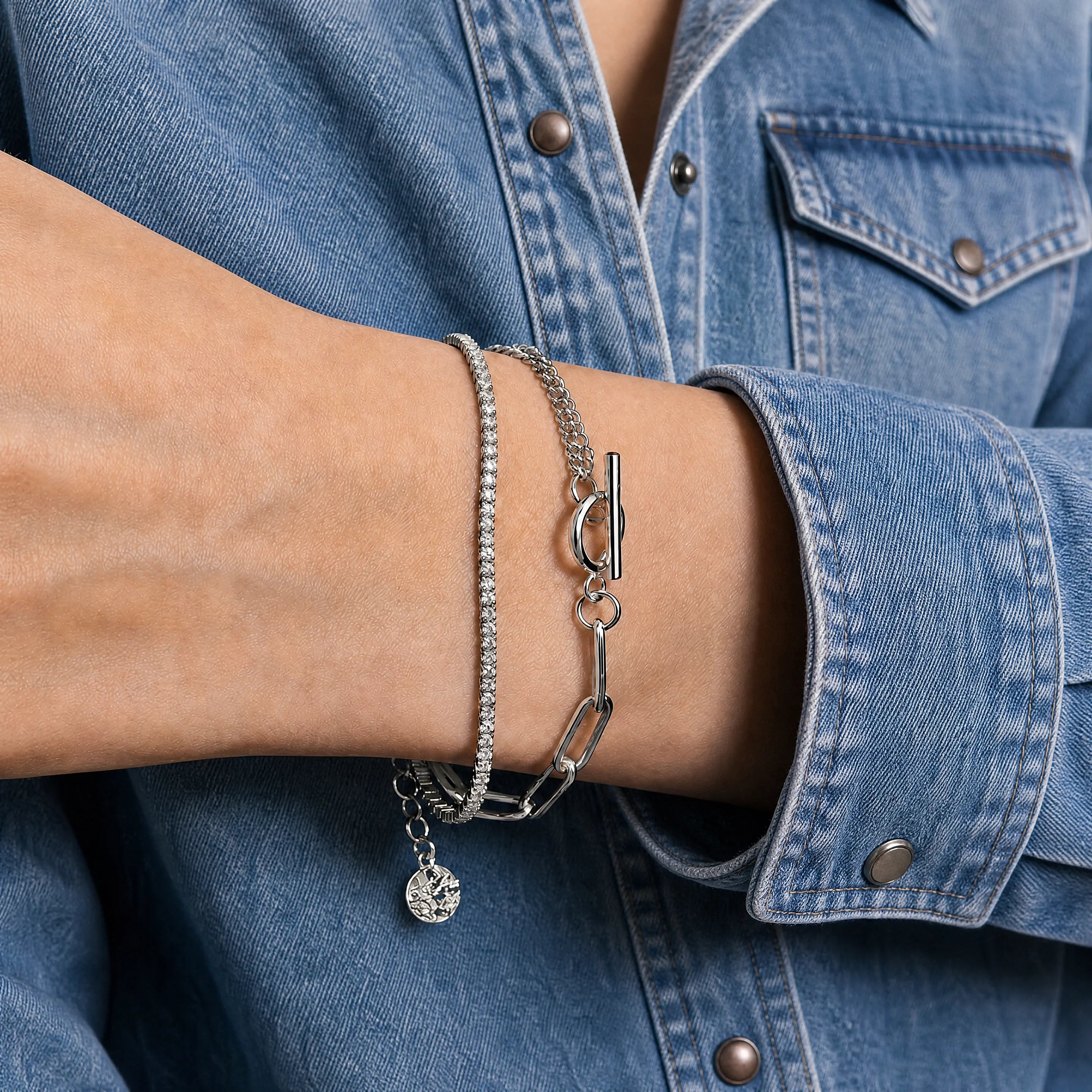 Life Force Silver Chain Bracelet by Frequency Paris Ibiza. Perfect to wear day to night, it’s chic, elegant and sophisticated. Worn here with a contemporary denim shirt. 
