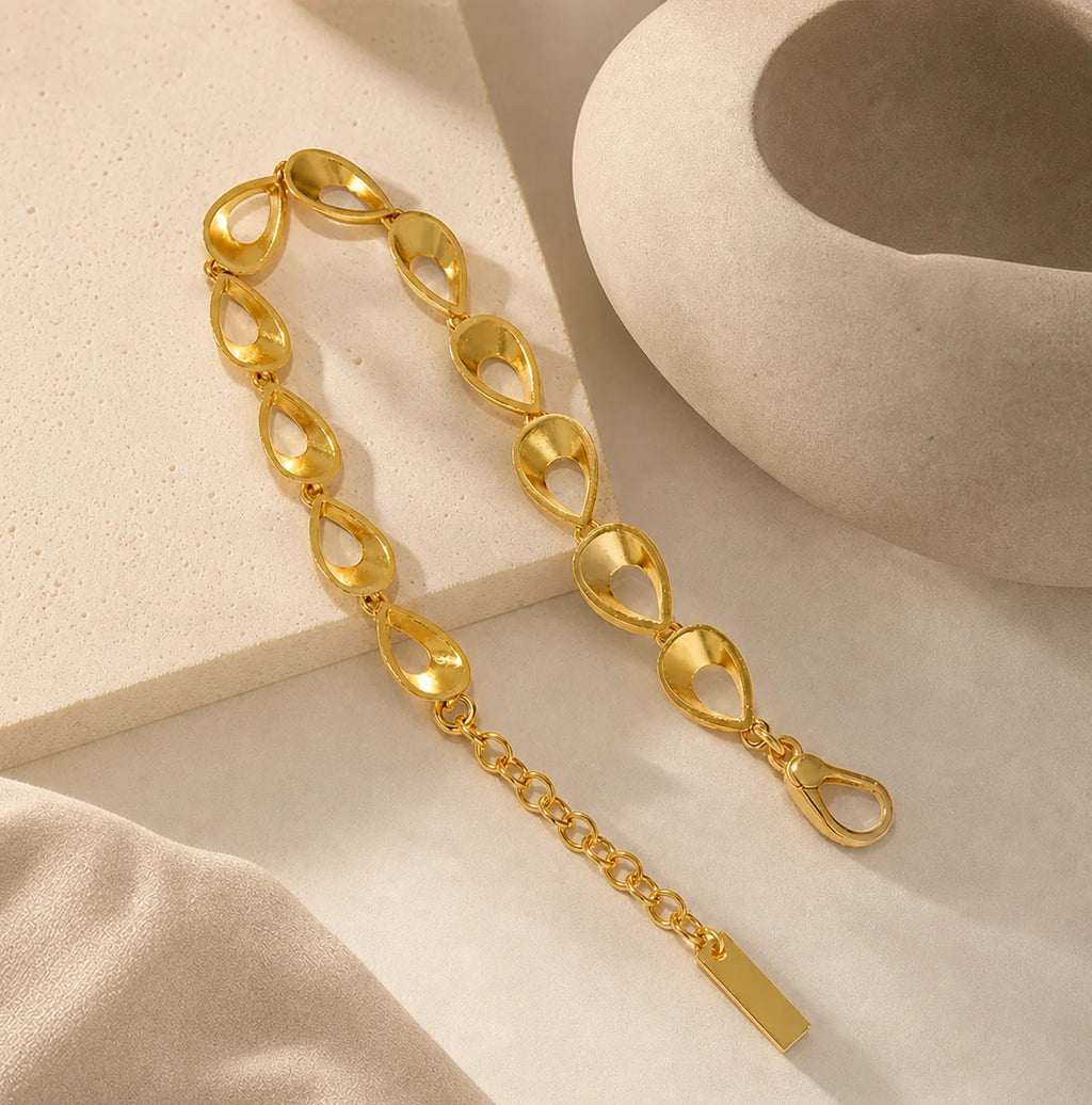 Close-up of Light Codes 18k gold plated bracelet by Frequency Paris-Ibiza showing sculptural organic shapes and exquisite craftsmanship
