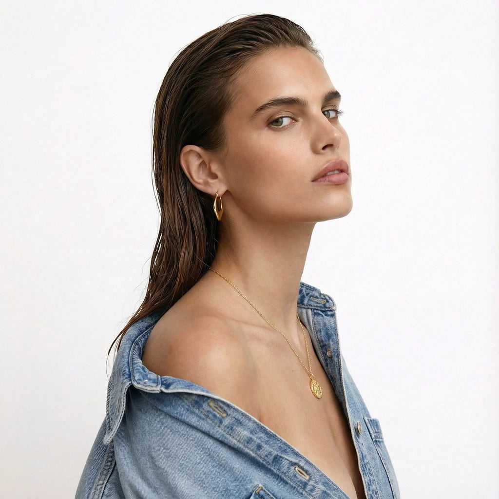 Manifest Gold Pendant Necklace by Frequency Paris Ibiza - 18k Gold plating on premium sterling silver, styled with Denim and the Gold Abundance Hoop Earrings. Wear them on repeat.