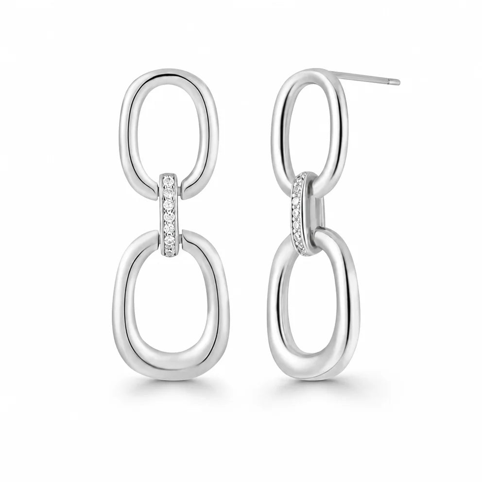 Frequency Paris-Ibiza Power Drop Earrings in rhodium-plated sterling silver. Close-up showing zircon crystal chain link accents as the focal point, elegant and refined statement design on a white background.