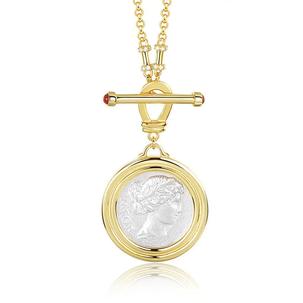 Soul Purpose Gold Pendant Necklace in silver coin finish — close-up detail of the pendant. Frequency Paris-Ibiza
