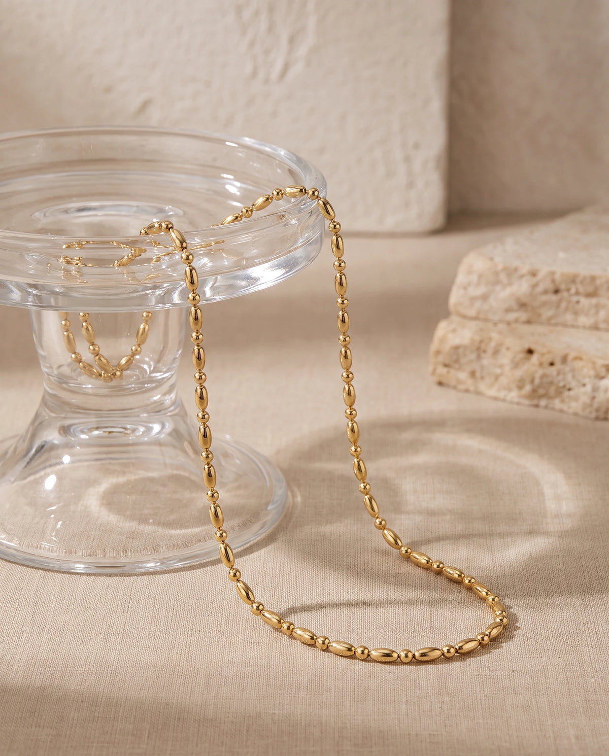 A closeup detail of the delicate strand of gold bead accents - Eclipse Gold Beaded Choker by Frequency Paris-Ibiza. Elegant, chic, effortless. Made for everyday wear. 