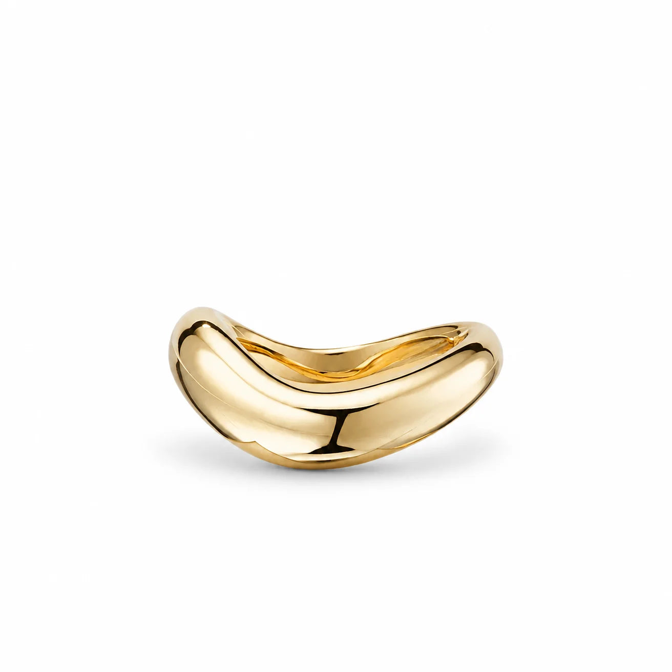 Close-up of the Stillness Ring by Frequency Paris-Ibiza showing the fluid sculptural design from one side in 18K gold plated sterling silver.