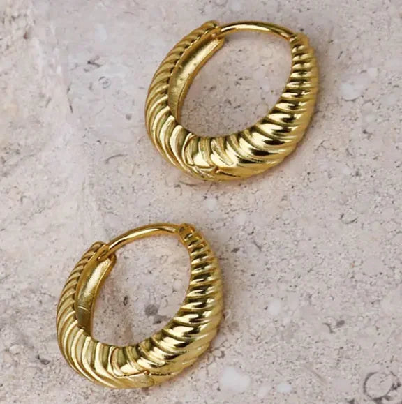 Close-up of the Costes Gold Hoop Earrings by Frequency Paris-Ibiza showing detailed rope texture.