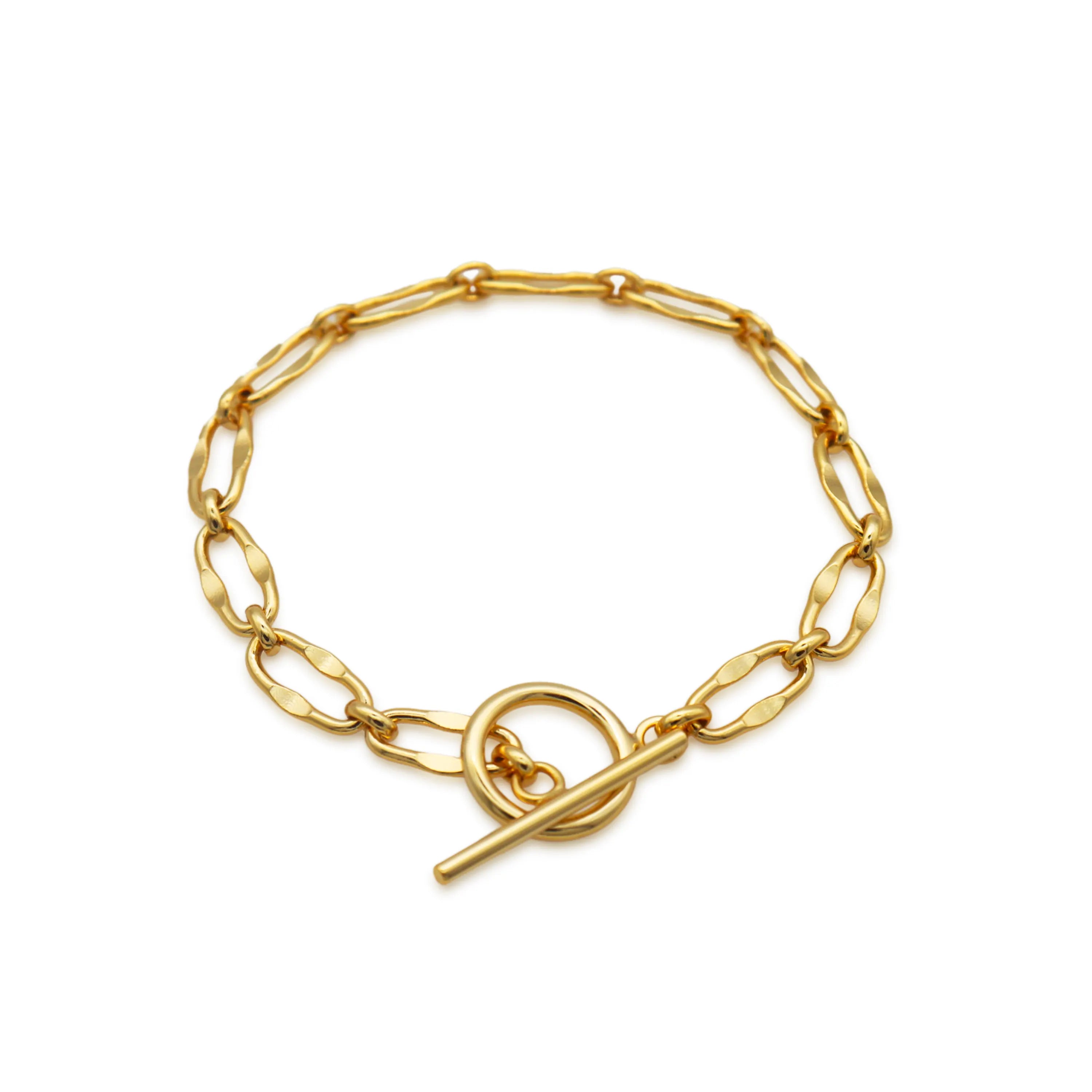 Burning Desire gold T-bar bracelet by Frequency Paris-Ibiza on white background