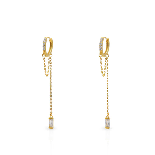 Frequency Paris–Ibiza Infinity Chain Earrings in 18K gold with crystal drops and delicate chain tassels, photographed on a white background.
