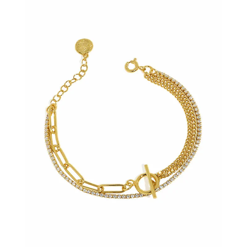 Life Force gold bracelet by Frequency Paris-Ibiza on a white background, showcasing elegant double chain design and zircon crystal detail.