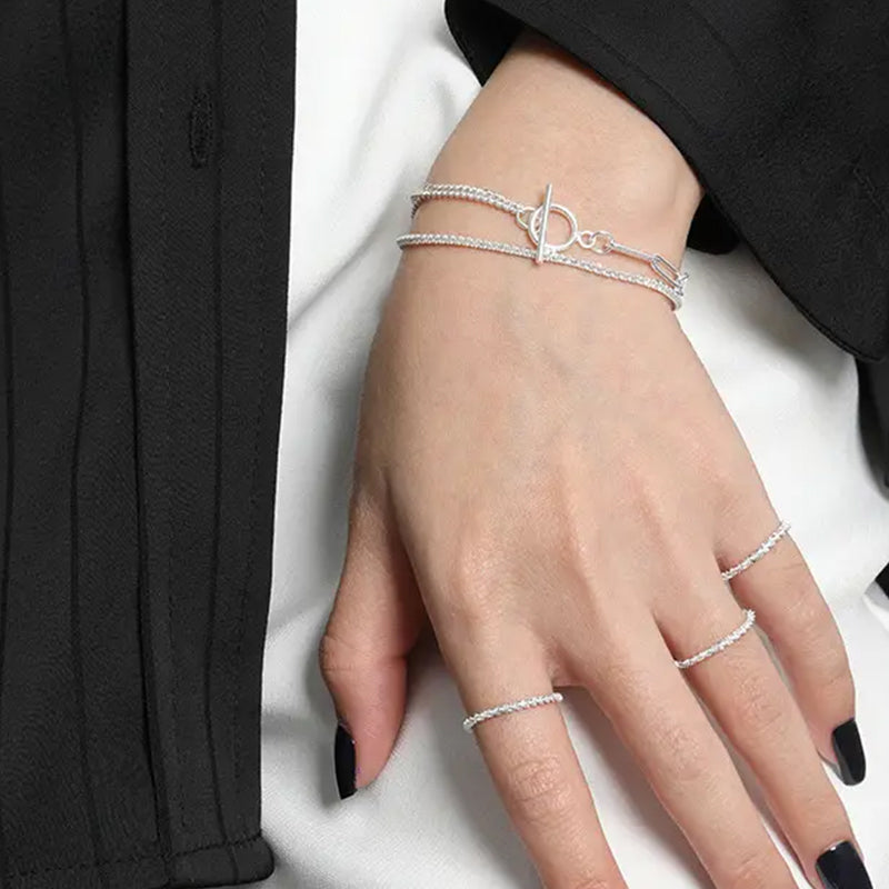 Frequency Paris-Ibiza Life Force silver bracelet worn on wrist, showing elegant layered chain design with zircon crystal detail.
