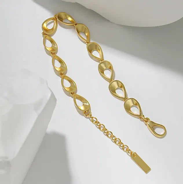 Close-up of Light Codes 18k gold plated bracelet by Frequency Paris-Ibiza showing sculptural organic shapes and exquisite craftsmanship