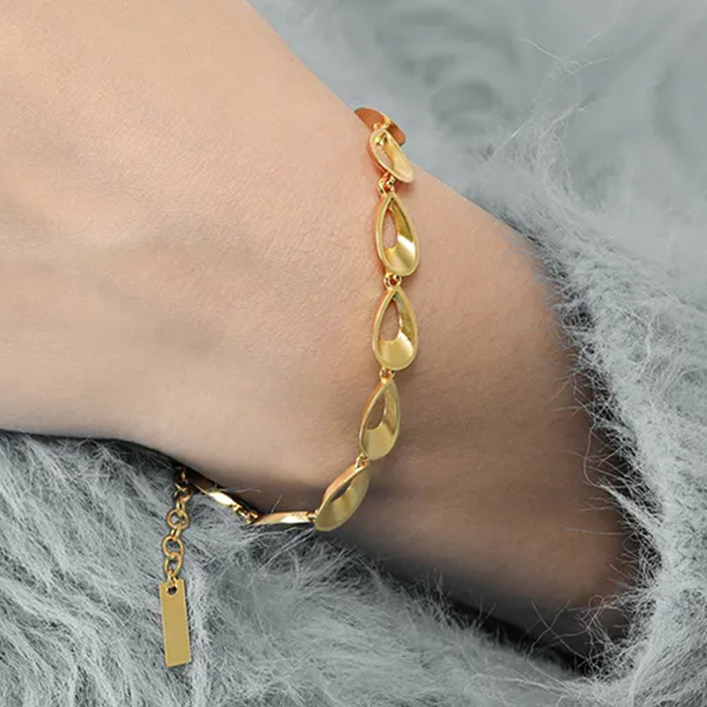 Light Codes 18k gold plated bracelet by Frequency Paris-Ibiza worn with cosy sweater adding a touch of glamour
