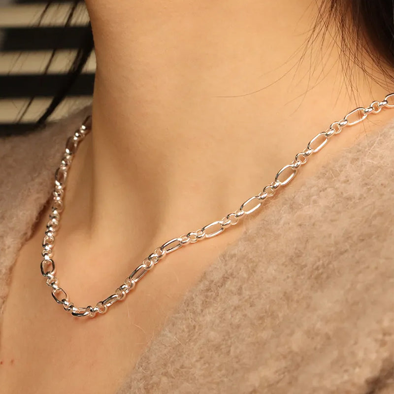 Majestic Silver Chain Necklace by Frequency Paris-Ibiza — close-up on model showing elegant design. Frequency Paris-Ibiza
