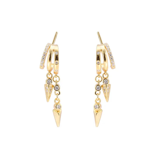 Frequency Paris–Ibiza Modern Goddess Drop Earrings in 18K gold-plated sterling silver with spike charms and gemstone accents, photographed against a white background.