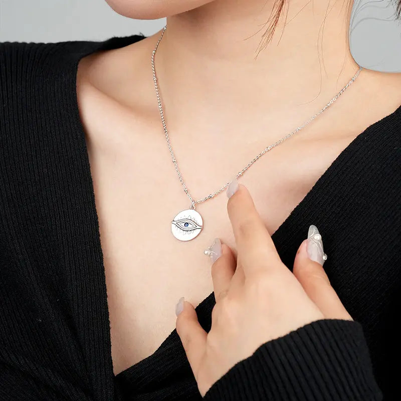 Protection Gold Pendant Necklace by Frequency Paris-Ibiza worn on model – 18K gold plated sterling silver pendant as statement centrepiece. Frequency Paris-Ibiza